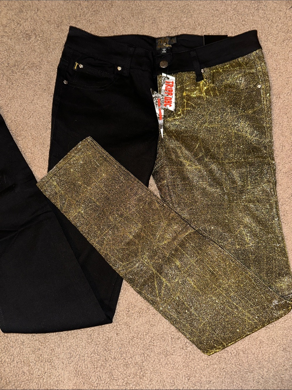 Tripp NYC Two-tone black, gold, and silver jeans.